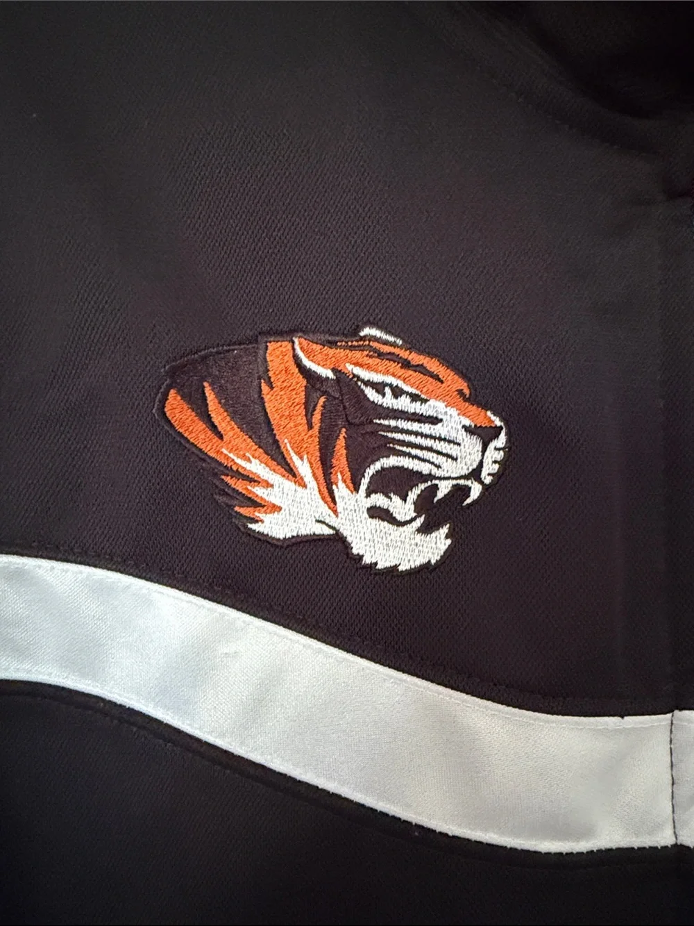 Jordan Black Track Jacket with White Trim and Orange Tiger Patch